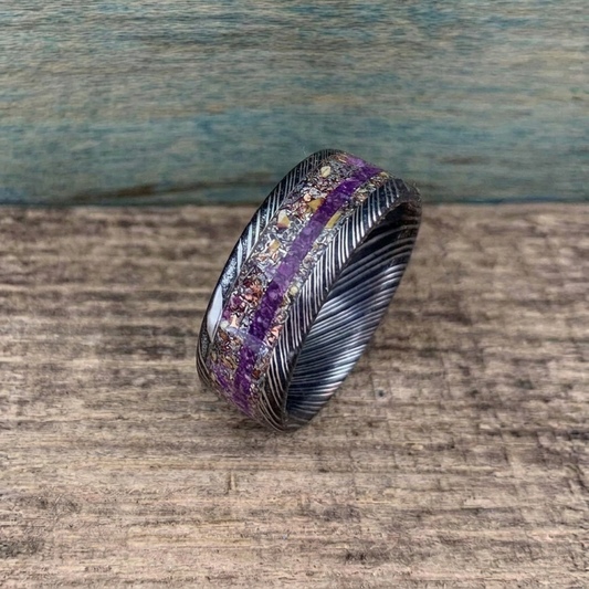 Damascus steel men's wedding band by RobandLean featuring dinosaur bone and meteorite inlay, with a polished square design.