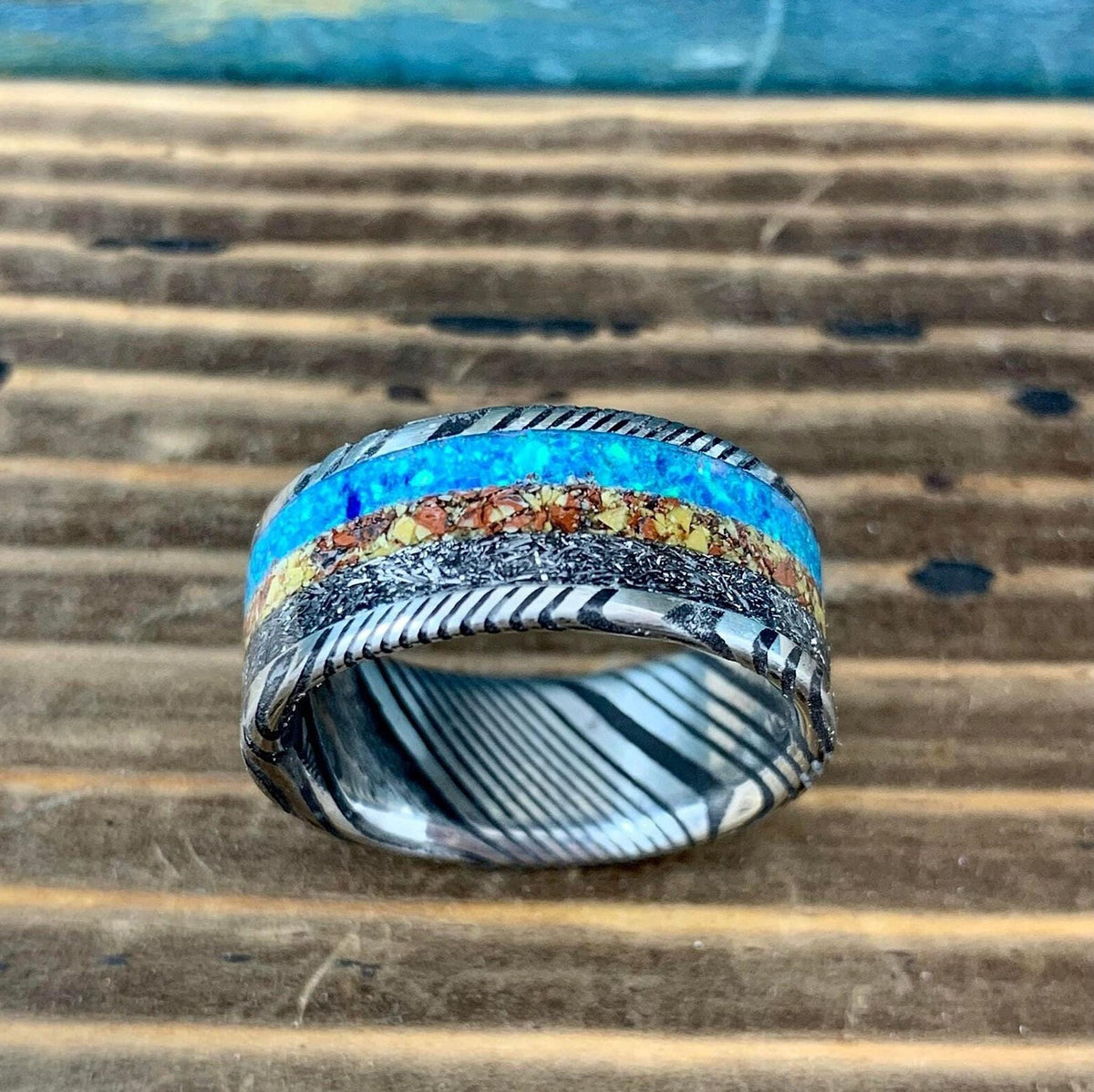 Damascus Steel Ring with Dinosaur Bone and Gibeon Meteorite Inlay
