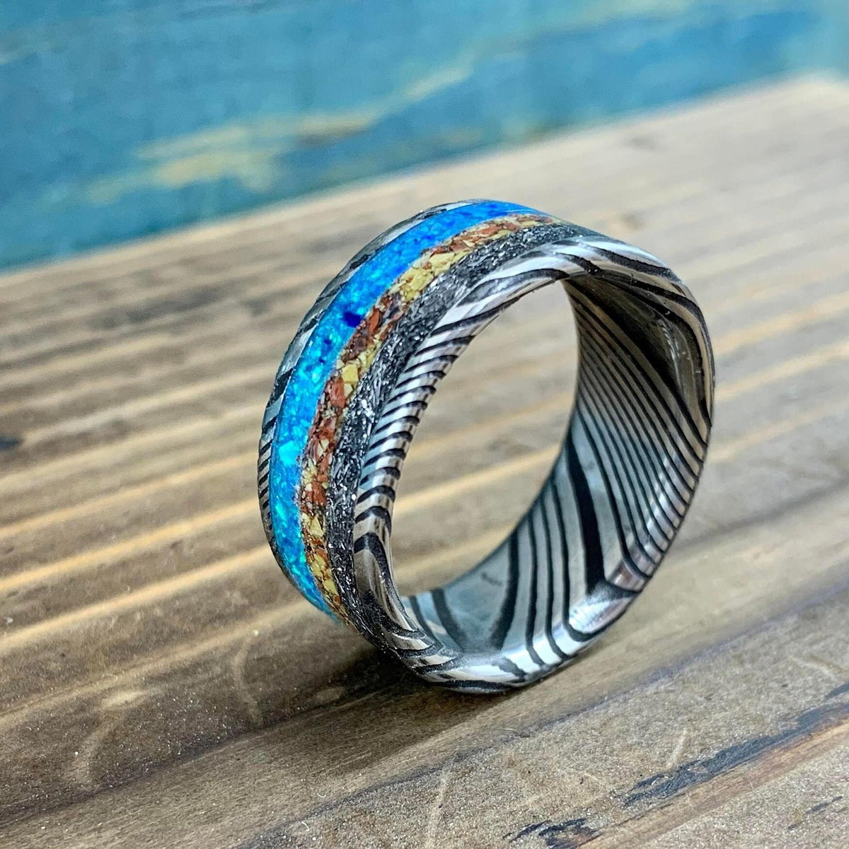 Damascus Steel Ring with Dinosaur Bone and Gibeon Meteorite Inlay