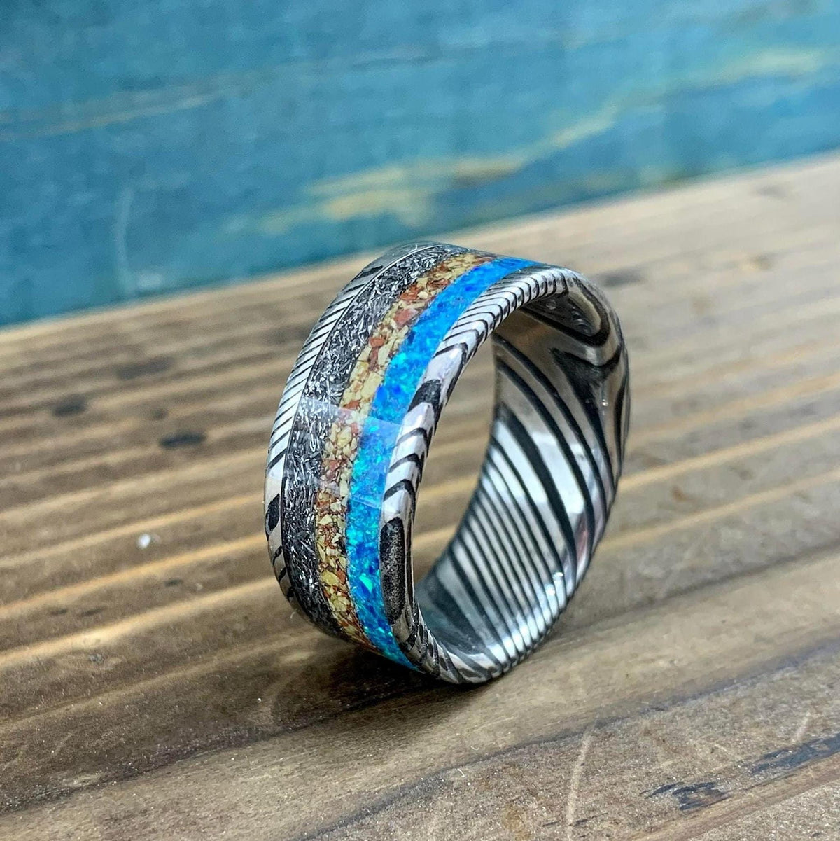 Damascus Steel Ring with Dinosaur Bone and Gibeon Meteorite Inlay
