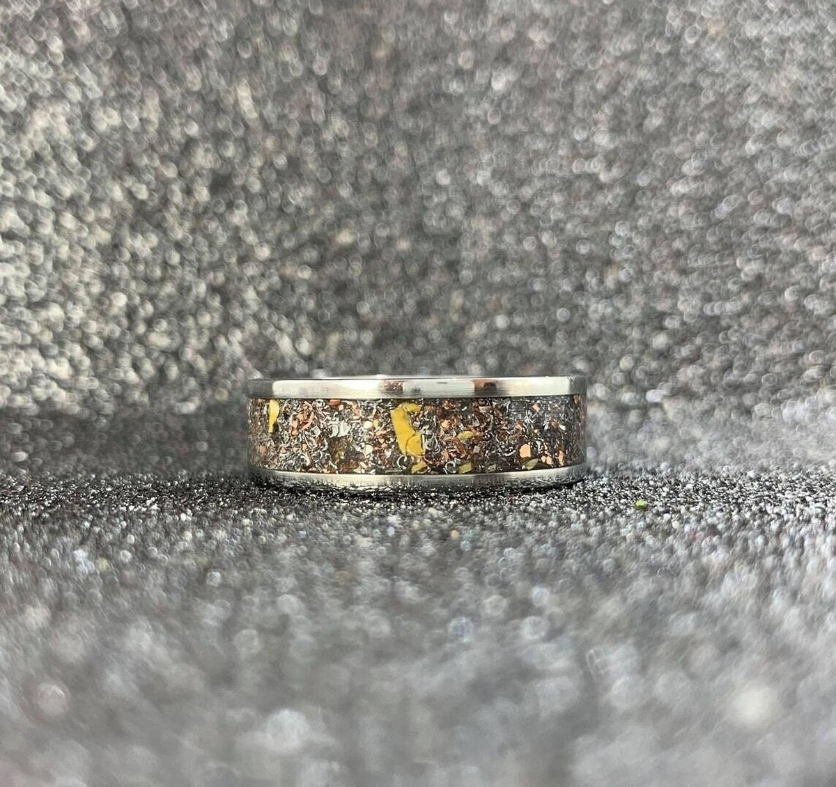 Men's aerospace titanium wedding band with meteorite and dinosaur bone inlay, featuring a sleek 4.3-4.4-5mm design from RobandLean's rings.