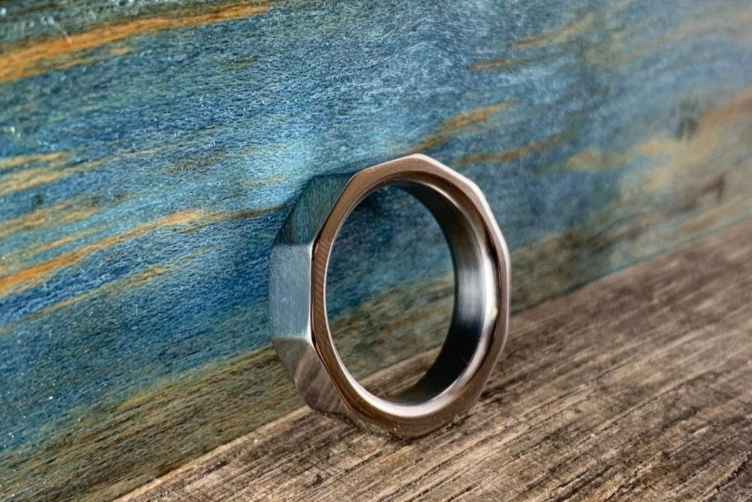 Men's Decagon Titanium Ring with ten-sided geometric design, durable wedding band by RobandLean's rings.