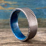 Damascus steel wedding band with blue box elder wood inlay, custom-made RobandLean's rings, 4.5mm width.