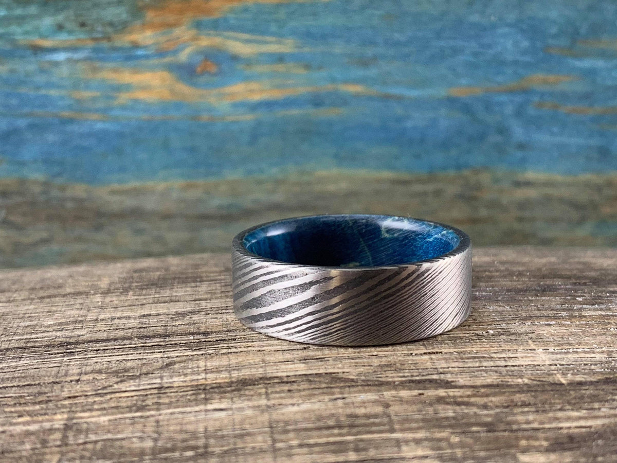 Damascus steel wedding band with blue box elder wood inlay, custom-made RobandLean's rings wedding ring, 4.5mm width.