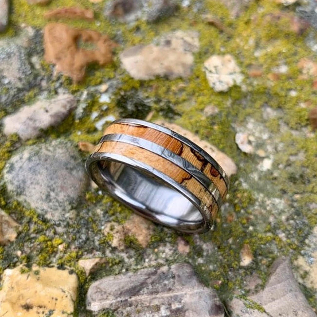 Men's titanium wedding band with pecan wood inlay, western-inspired design from RobandLean's rings.