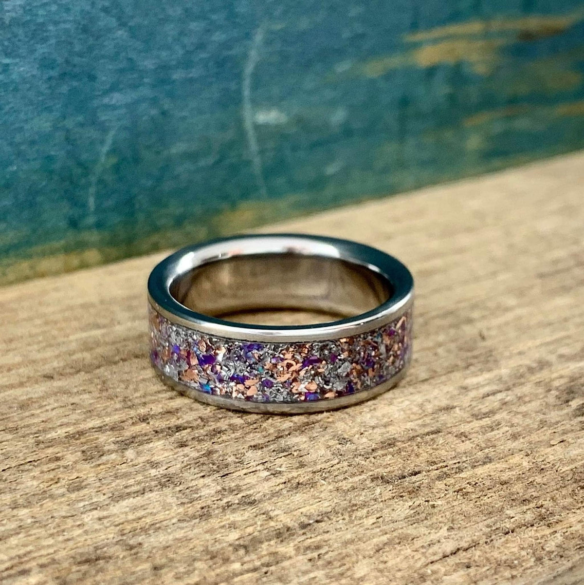 Mens titanium wedding band with meteorite inlay, featuring purple opal, amethyst, and sugilite accents from RobandLean's rings.