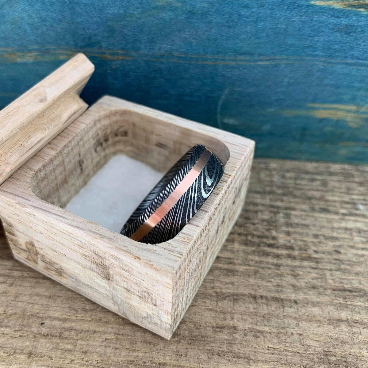 Damascus steel and copper men's wedding band with inlaid copper detail, stainless steel RobandLean's rings design