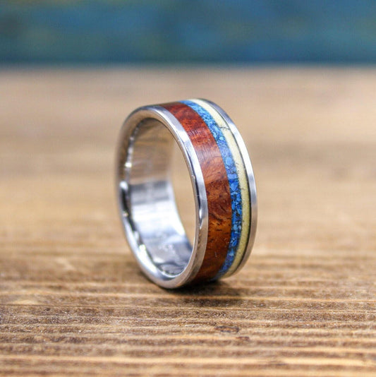 RobandLean's titanium men's wedding band featuring Amboyna burl wood and turquoise inlay, showcasing craftsmanship and unique design.