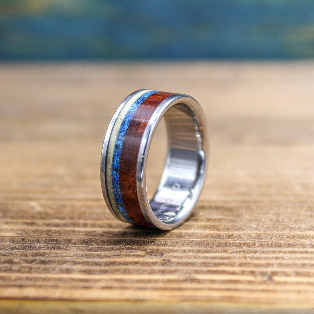 Titanium men's wedding band with Amboyna burl wood and turquoise inlay from RobandLean's rings, size 5.5mm.