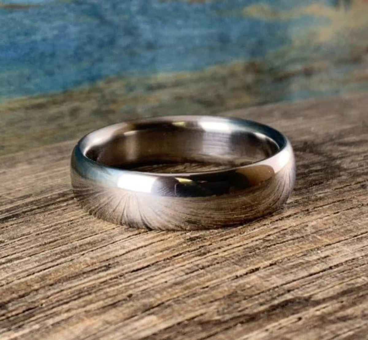Classic plain polished titanium wedding band with high-shine mirror finish
