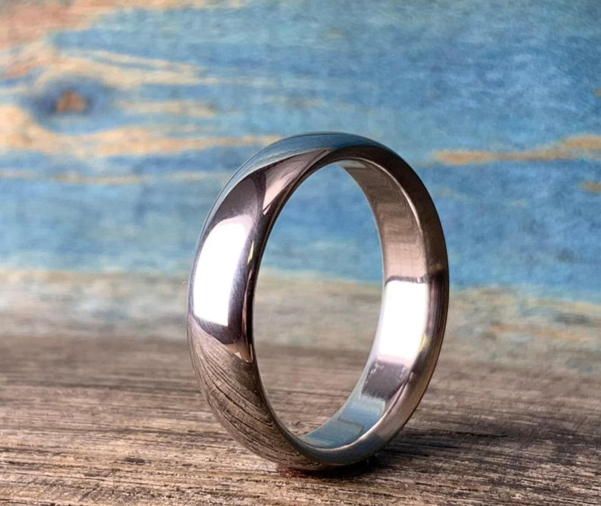 Top-down view of timeless hypoallergenic plain titanium wedding ring