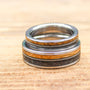 Gunslinger wedding band set with charred oak whiskey barrel wood and guitar string inlays