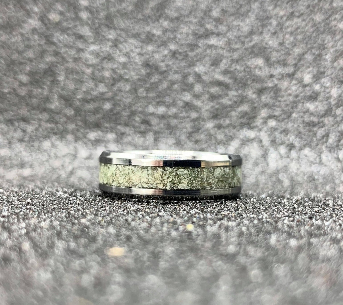RobandLean's green jade tungsten ring featuring a smooth, polished band with a vibrant green jade inlay and sleek metallic finish.