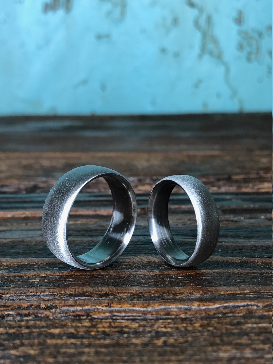 RobandLean's luster finish titanium wedding band set featuring sleek, durable rings with a polished, shiny surface for couples.