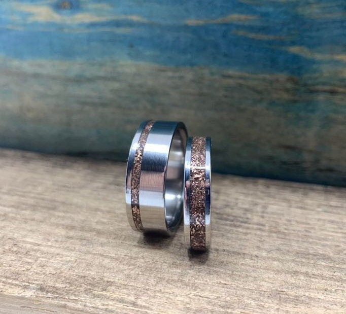 RobandLean's titanium rose gold wedding bands set featuring elegant matching his and hers rings with a smooth finish.