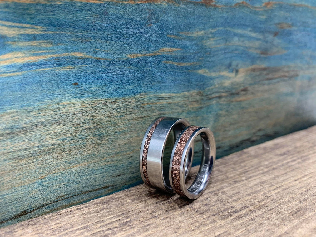 RobandLean's titanium rose gold wedding bands set for him and her, with sleek, elegant matching rings suitable for wedding or special occasions.