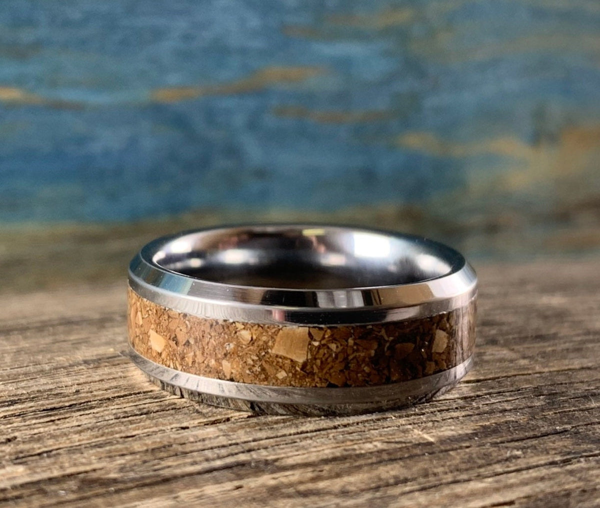Men's tungsten ring with T-Rex dinosaur bone inlay, RobandLean's stylish wedding band featuring intricate dinosaur bone details.
