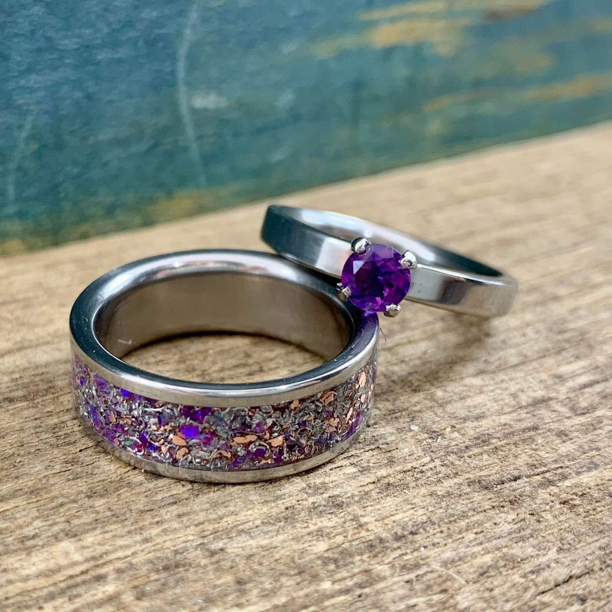 RobandLean's amethyst wedding band set featuring his and hers meteorite engagement rings, showcasing purple gemstones and textured metal bands.