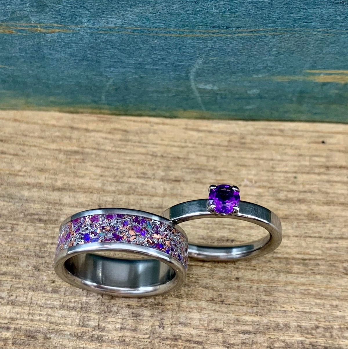 RobandLean's amethyst wedding band set featuring his and hers meteorite engagement rings with purple gemstones and modern design.