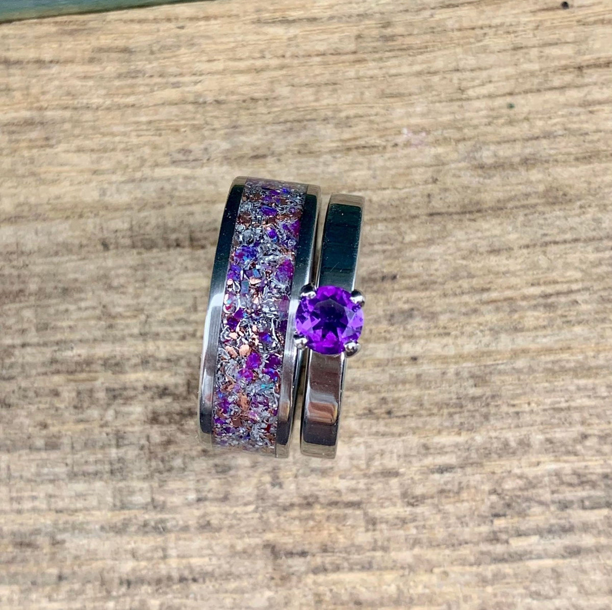 RobandLean's amethyst wedding band set featuring his and hers meteorite engagement rings, showcasing intricate designs and polished finishes.