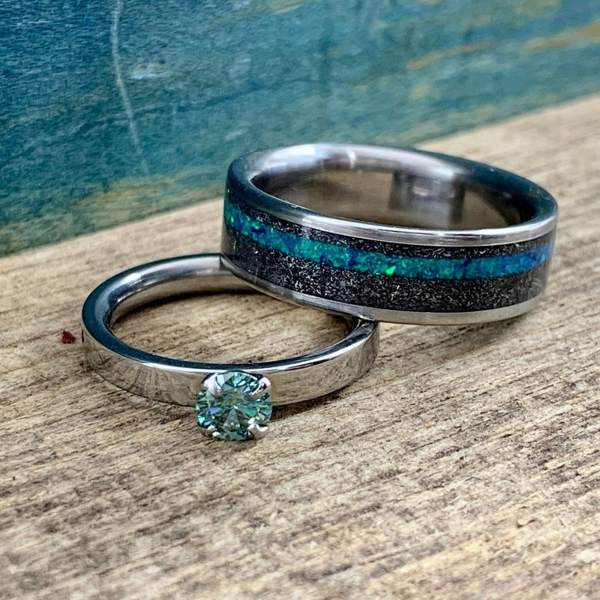His and hers meteorite wedding band set with moissanite engagement ring by RobandLean, featuring sleek, modern design and sparkling gemstones.