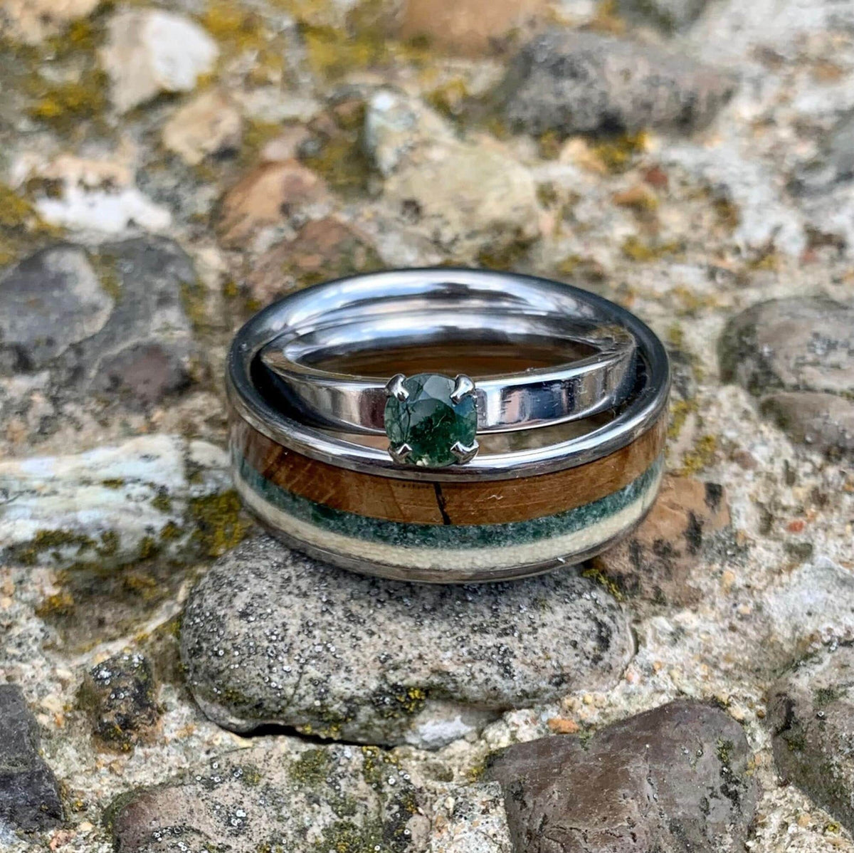 RobandLean's Moss Agate wedding band set with English oak and deer antler accents, featuring an engagement ring and matching wedding band.