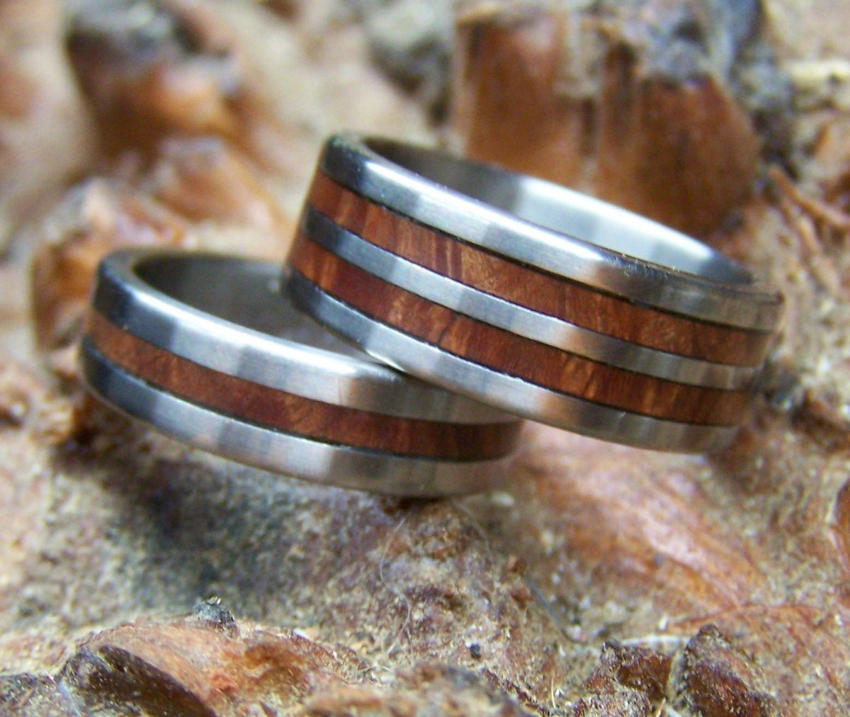 RobandLean's titanium and manzanita wedding band ring set featuring sleek titanium bands with natural manzanita accents.