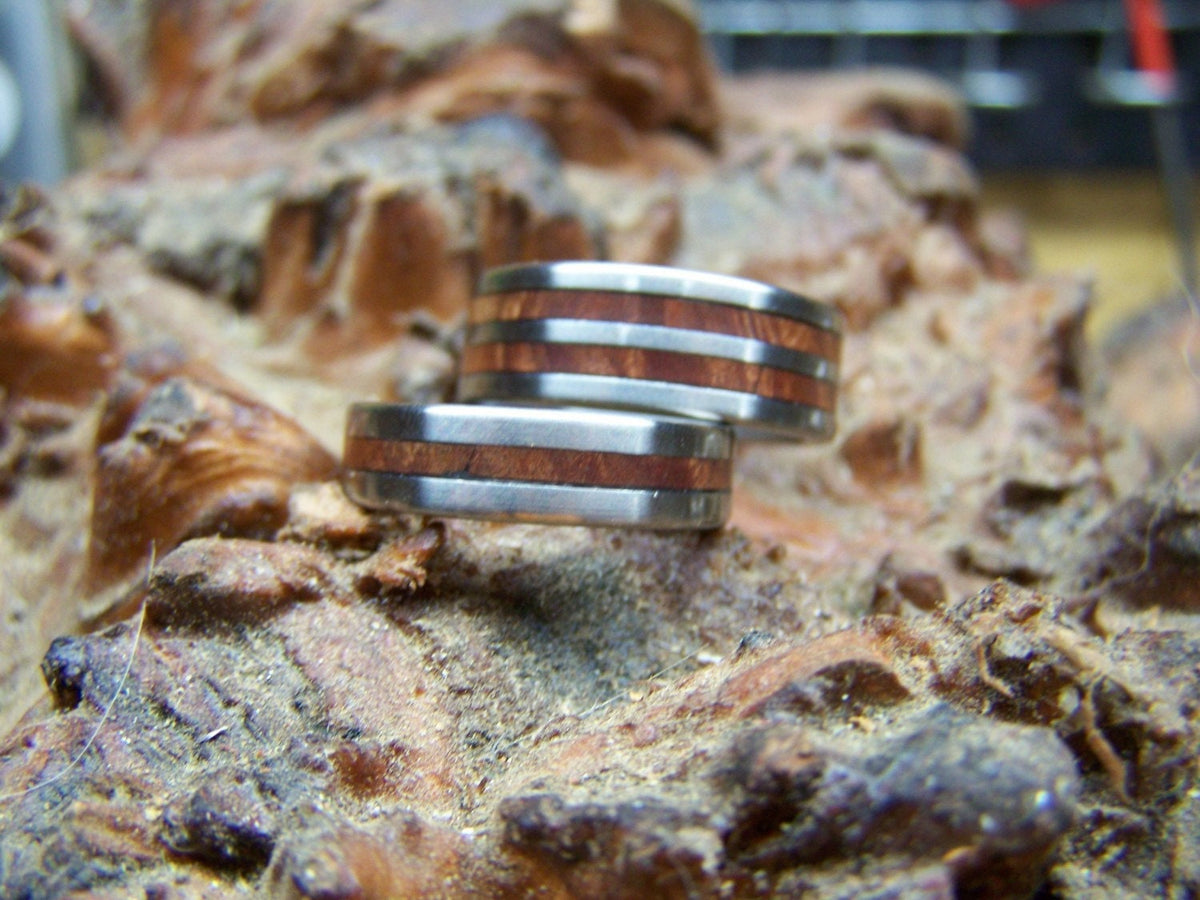 Titanium and Manzanita wedding band set by RobandLean's rings, featuring sleek titanium and natural Manzanita wood accents.