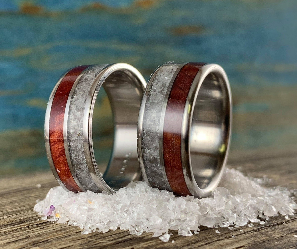 Titanium wedding band set with redwood and rose quartz accents, crafted by RobandLean's rings for elegant wedding jewelry.