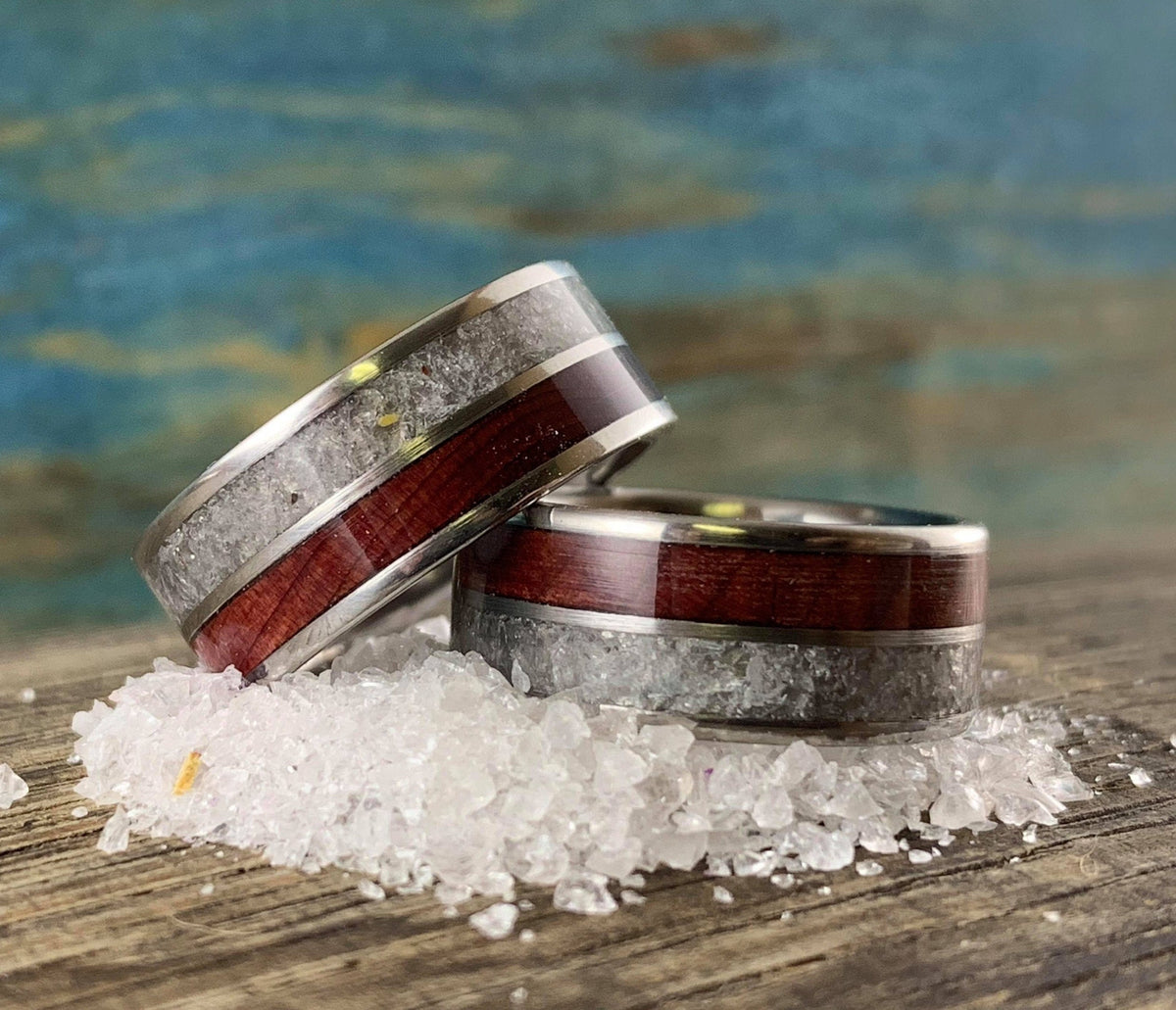 Titanium wedding band set by RobandLean's rings featuring redwood and rose quartz accents, showcasing elegant wedding jewelry.
